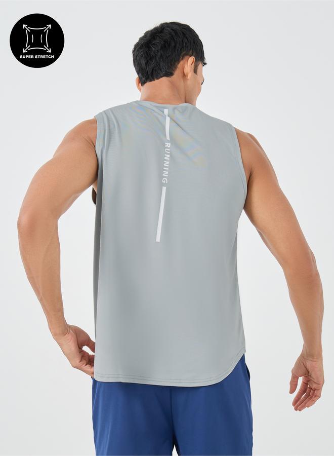 ستايلي اكتيف تانك ستايلي مطبوع من الخلف فائق التمدد بحافة منحنية وفتحة ذراع ساقطة - Image 1