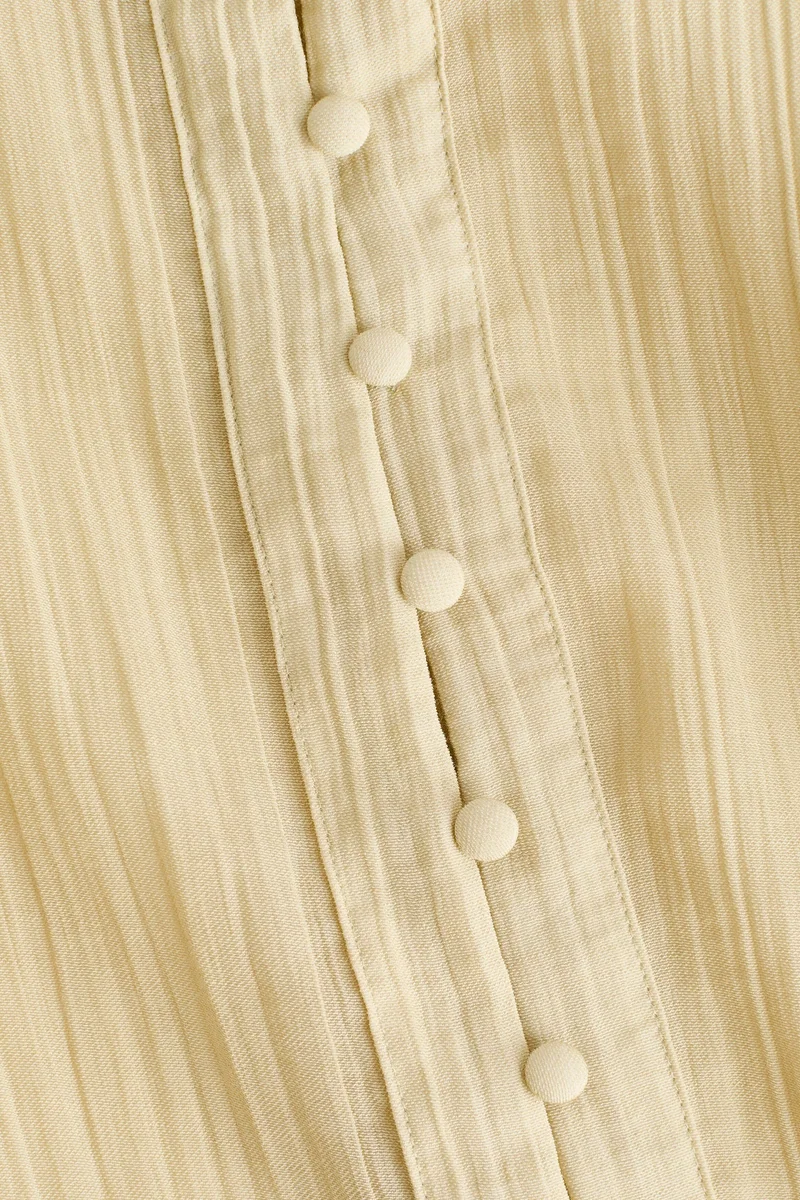 اتش اند ام بلوزة بأكمام منفوخة