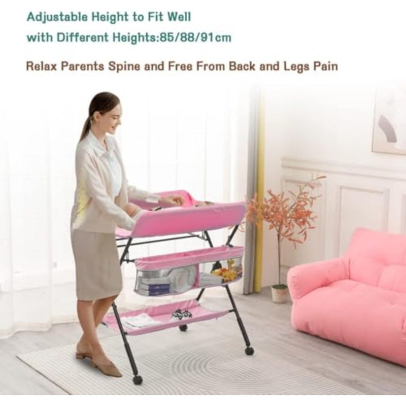 Portable baby changing table with wheels for nursery use, made of durable plastic in pink color, featuring adjustable height, folding design, and integrated storage rack for convenience and space-saving. - Image 5