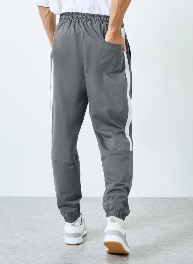 Styli  Men Grey Track Pants with Side Stripe for Men | Best Price UAE