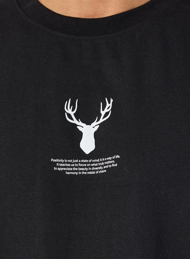 Styli Reindeer Graphic Oversized T-Shirt with Sleeve Badge