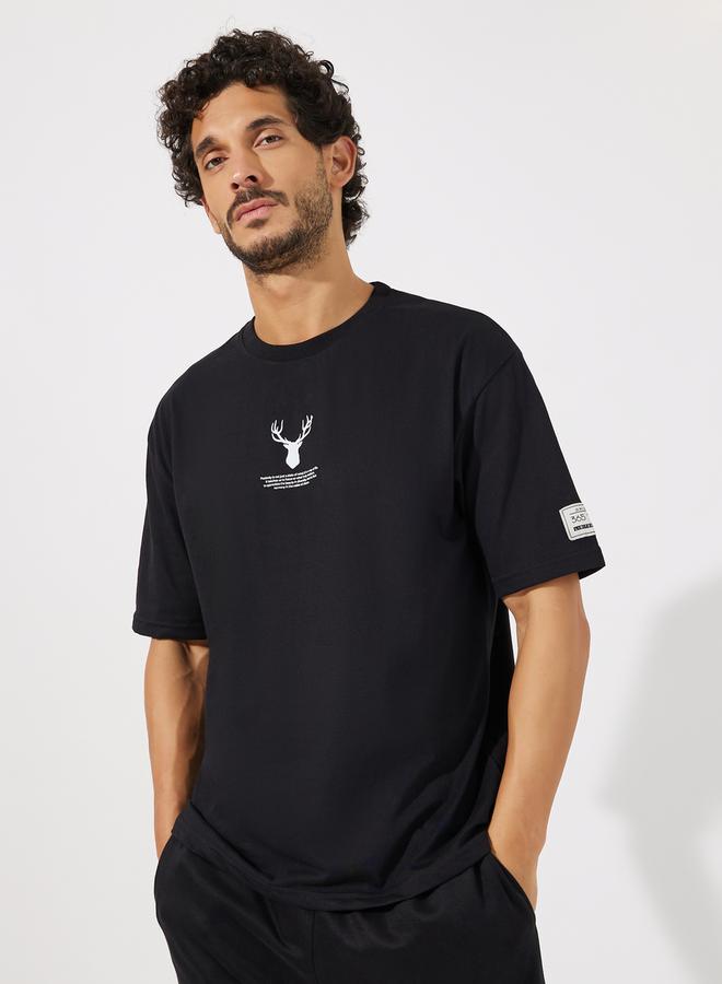 Styli Reindeer Graphic Oversized T-Shirt with Sleeve Badge - Image 1