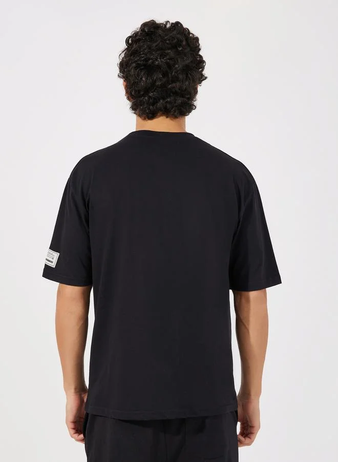 Styli Reindeer Graphic Oversized T-Shirt with Sleeve Badge