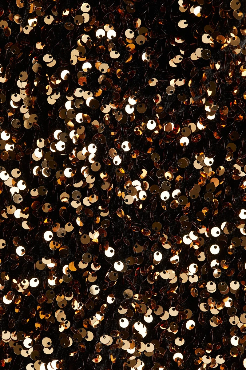 اتش اند ام فستان مزين بالترتر على شكل A