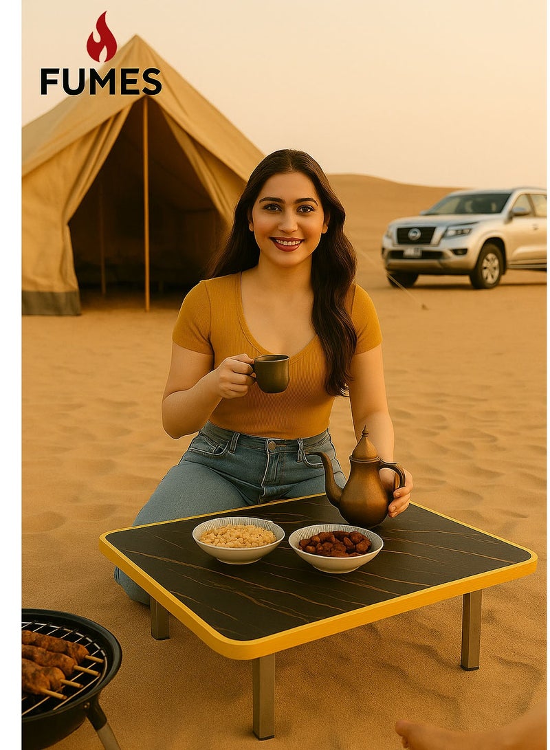 الأبخرة طاولة مجلس أرضية محمولة بلمسة نهائية من الرخام الأسود وحواف ذهبية وأرجل فولاذية، مثالية للشاطئ والتخييم الصحراوي وتناول الطعام في الهواء الطلق واحتساء الشاي.  - Image 1