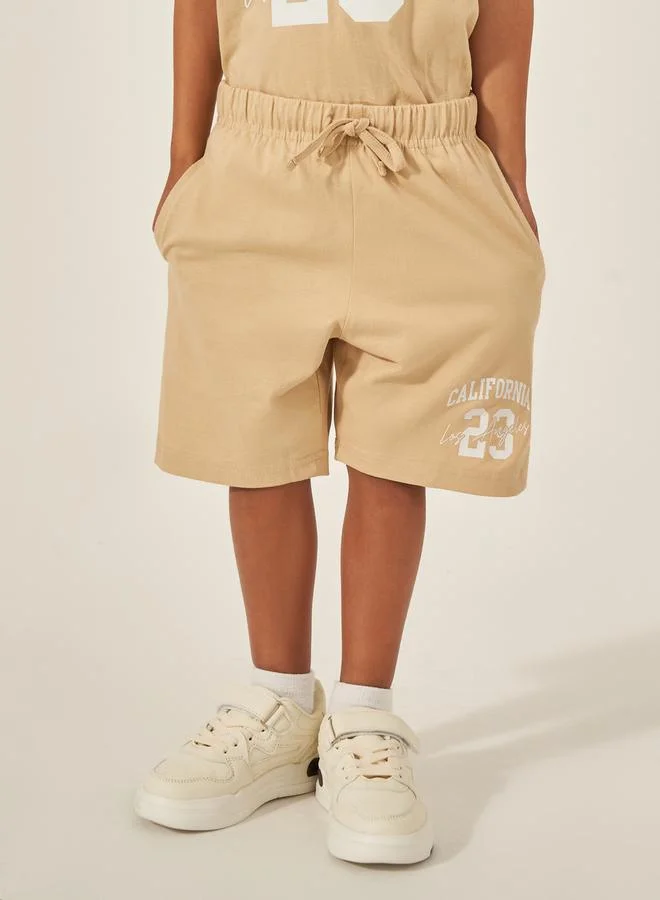 Styli Slogan Print Short Sleeve T-Shirt and Shorts Set