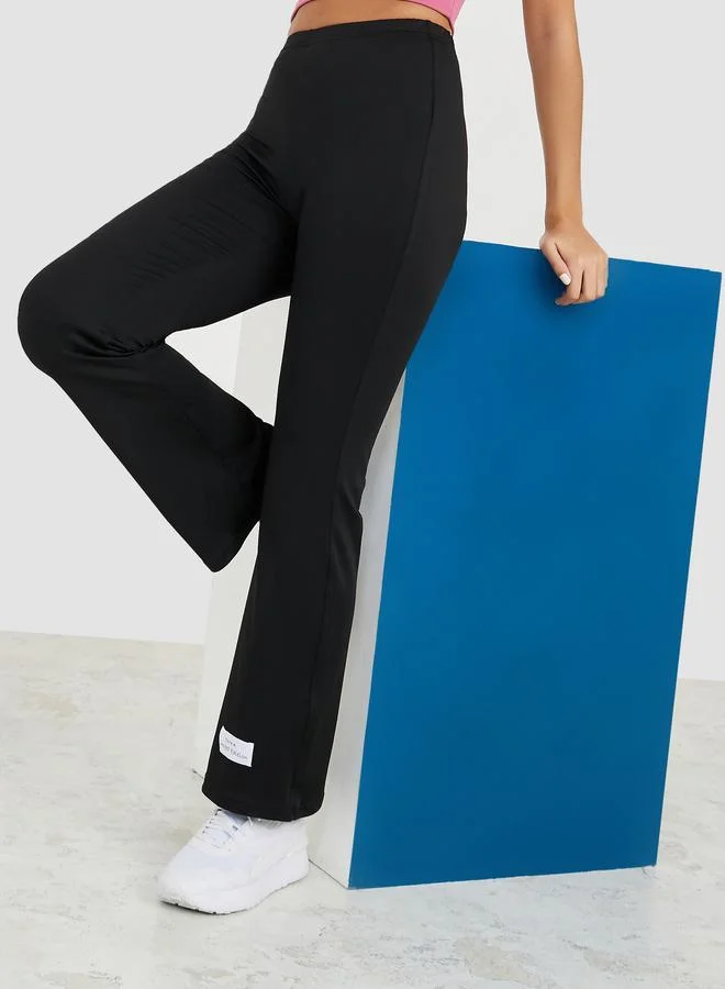 Styli Active High Rise Patch Detail Flared Leggings