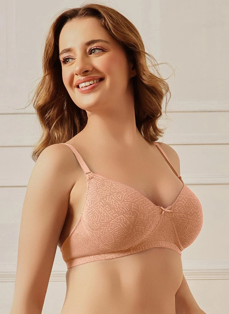 Clovia Peach Clovia Padded Non-Wired Full Coverage Geometric Print Multiway T-shirt Bra in Peach Colour for Women | Best Price UAE