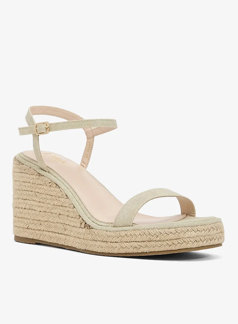 ايلا صندل نسائي بكعب ويدج