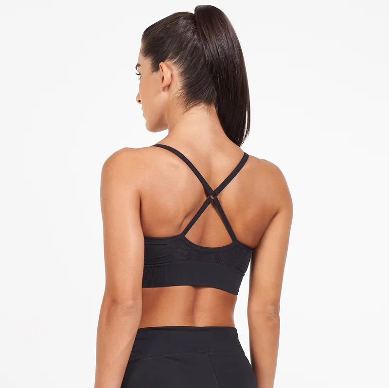 نايكي صدرية رياضية إندي بدعم خفيف باديد للنساء