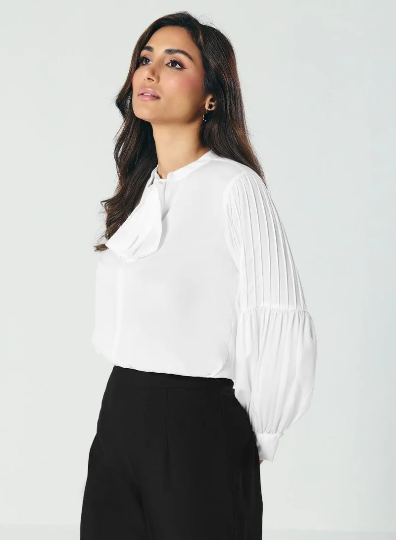 زجزاج بلوزة بأكمام طويلة وكسرات على شكل فانوس