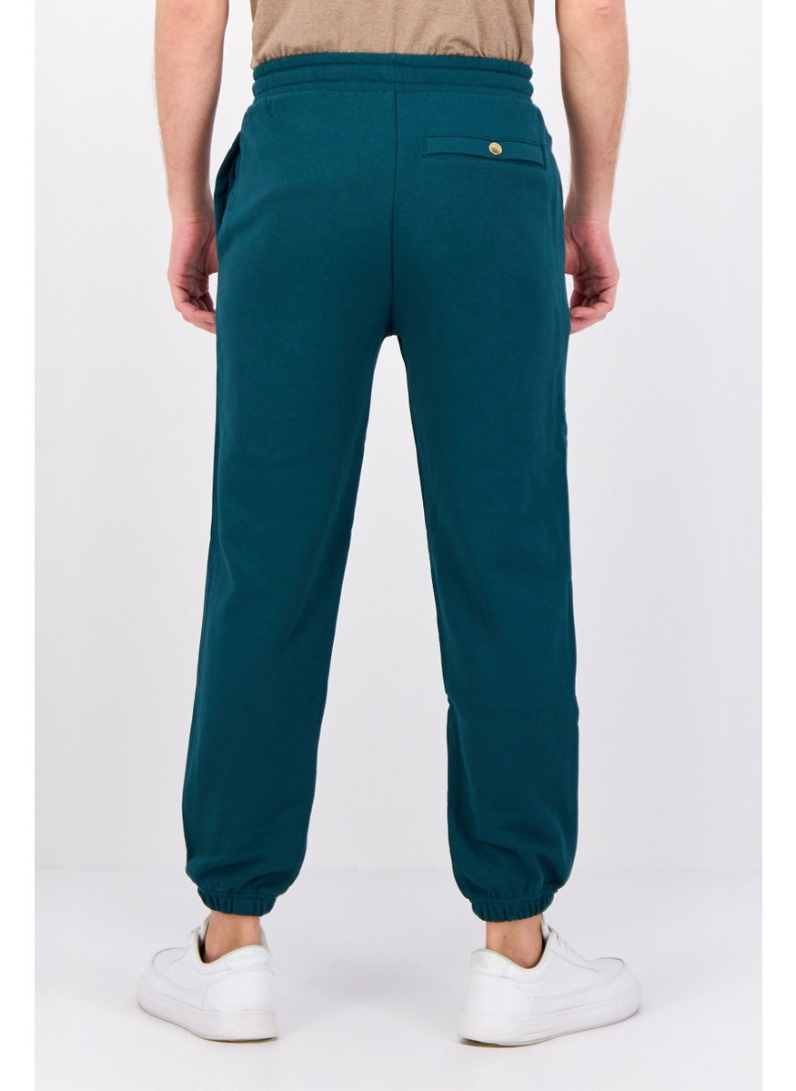 Puma x Staple Men Sportswear Fit Outdoor Sweatpant, Green  - Image 3