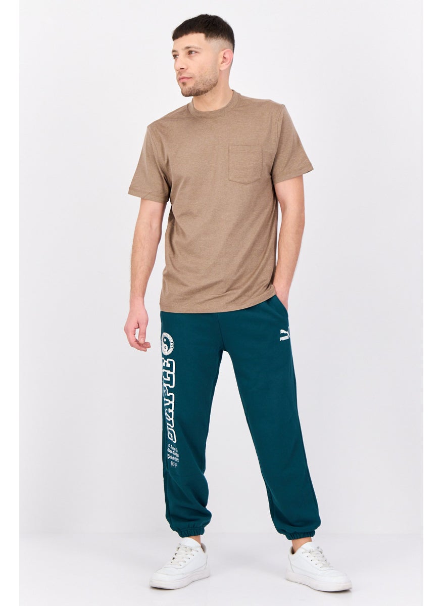 Puma x Staple Men Sportswear Fit Outdoor Sweatpant, Green  - Image 4
