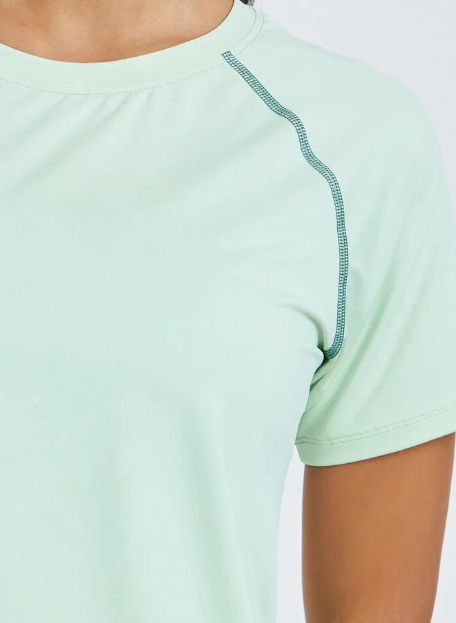 Styli Active  Green Contrast Stitch Detail Short Sleeves Top for Women | Best Price UAE