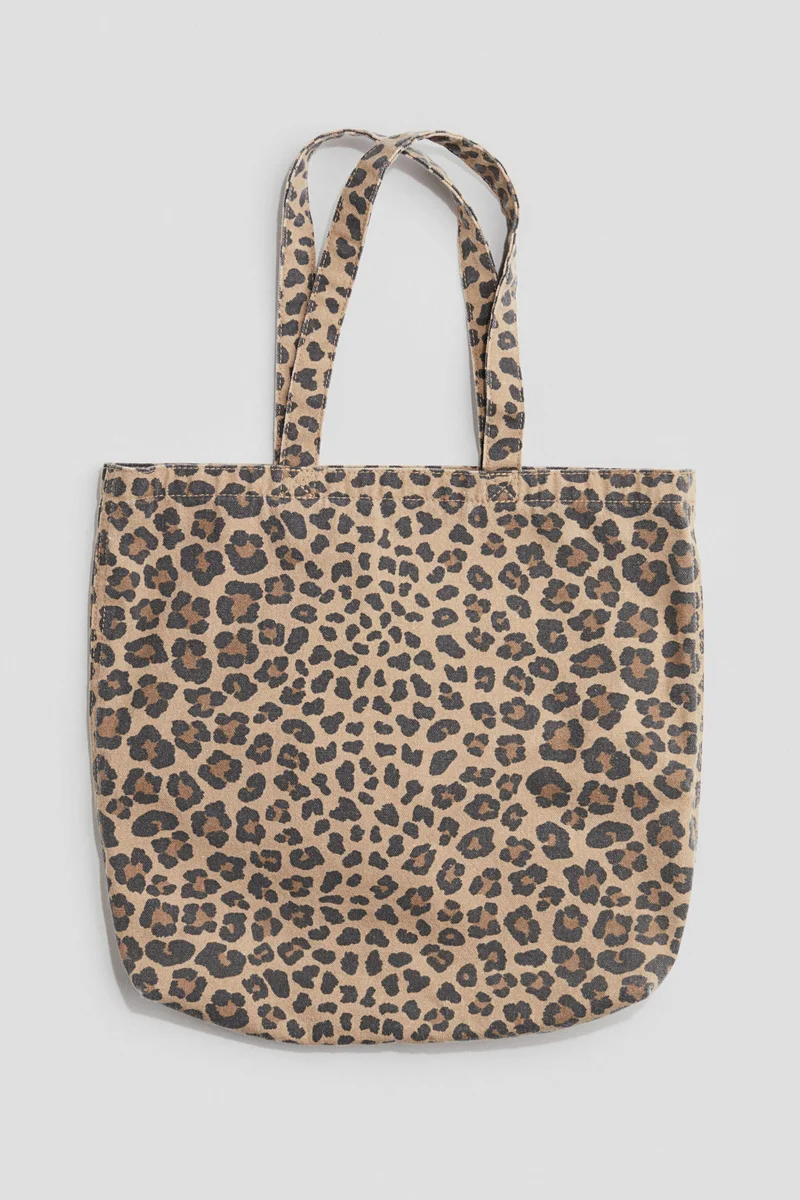 اتش اند ام حقيبة واسعة منقوشة