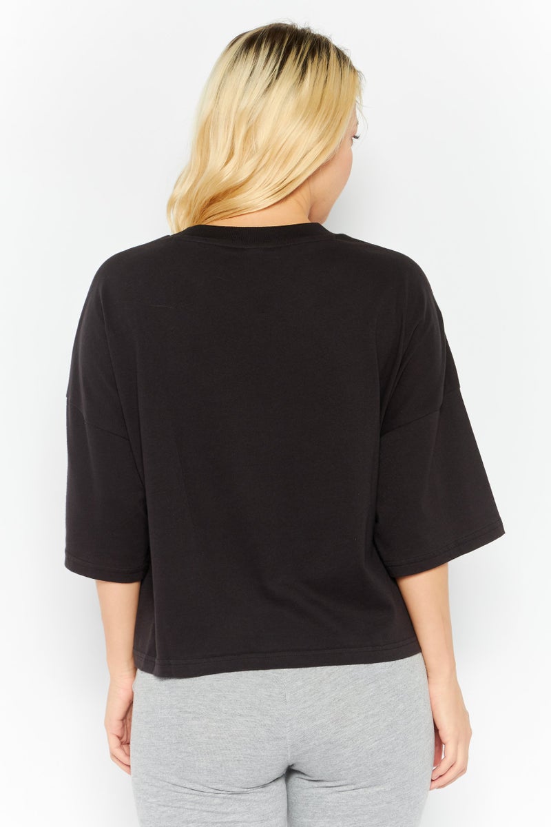 PUMA تي شيرت تدريب قصير الأكمام للنساء بحجم كبير، أسود - Image 4