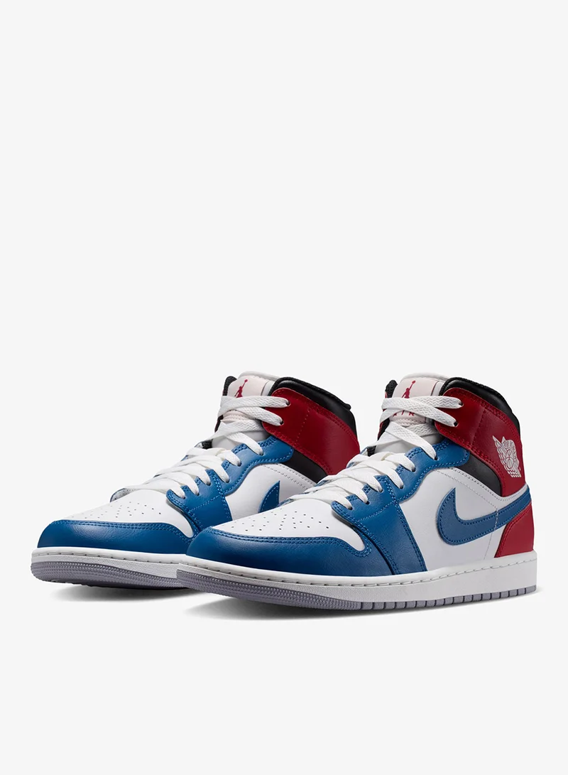 Jordan TRUE BLUE/SUMMIT WHITE-VARSITY RED-BLACK-CEMENT GREY Air Jordan 1 Mid for Men | Best Price UAE