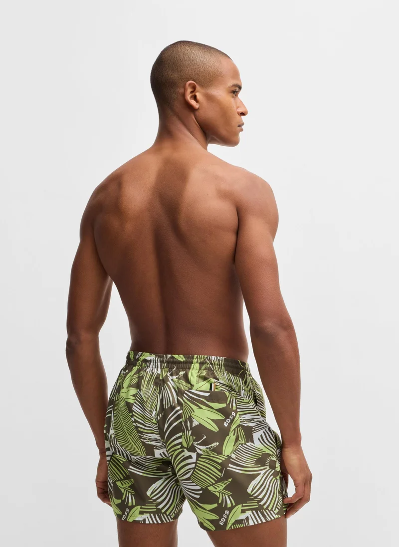 بوس Fully lined swim shorts with seasonal print