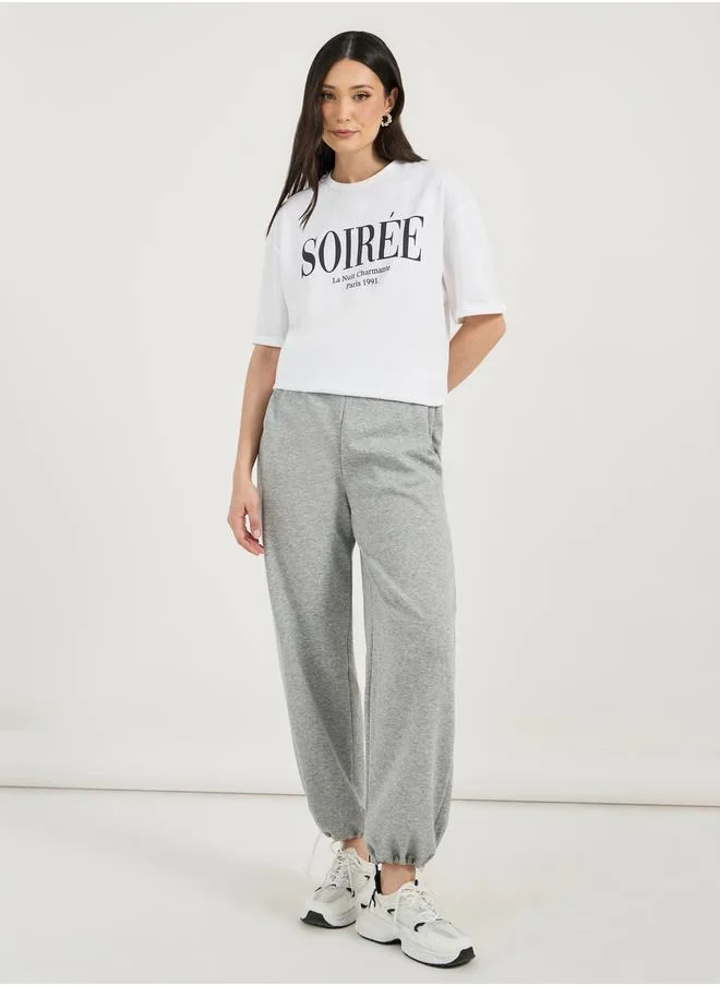 Styli Oversized Slogan Print Round Neck T-Shirt