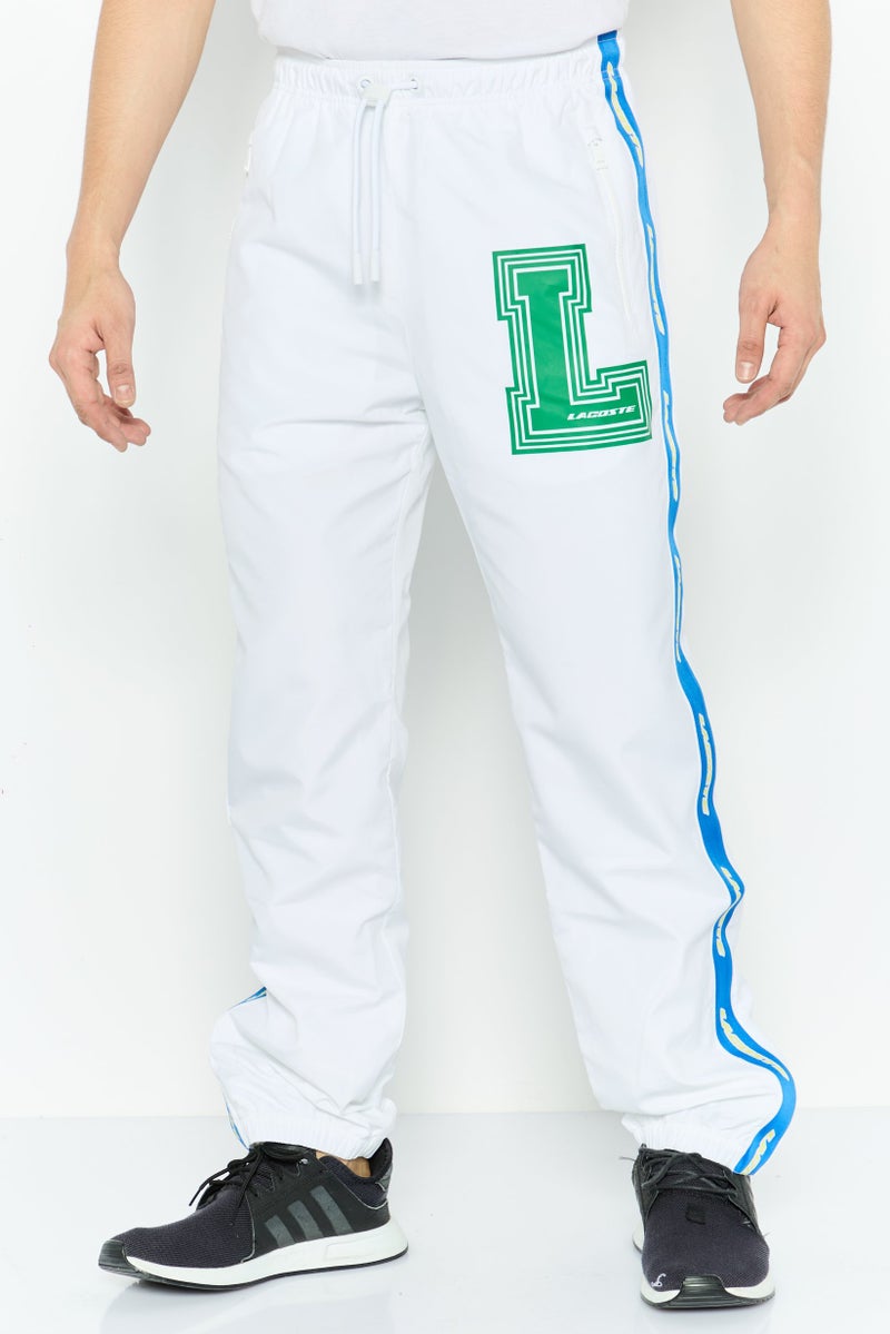 LACOSTE Men Relaxed Fit Brand Logo Training Pants, White Combo  - Image 1