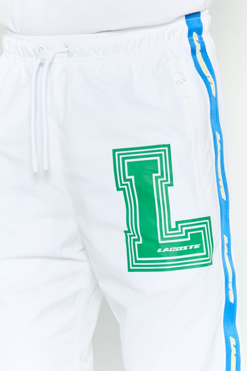 LACOSTE Men Relaxed Fit Brand Logo Training Pants, White Combo  - Image 4
