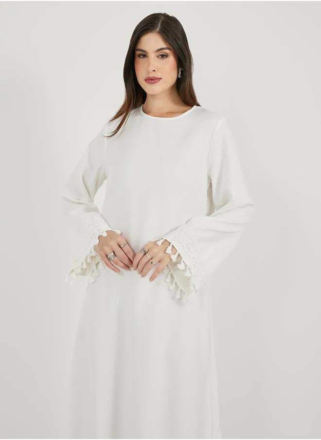 Styli Solid Tasselled Long Sleeve Shift Maxi Dress