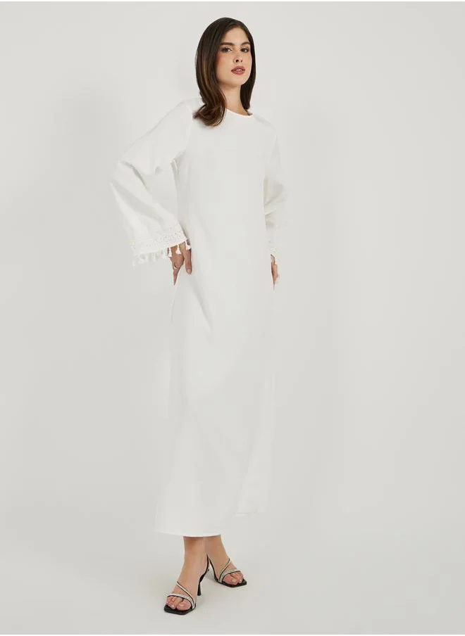 Styli Solid Tasselled Long Sleeve Shift Maxi Dress