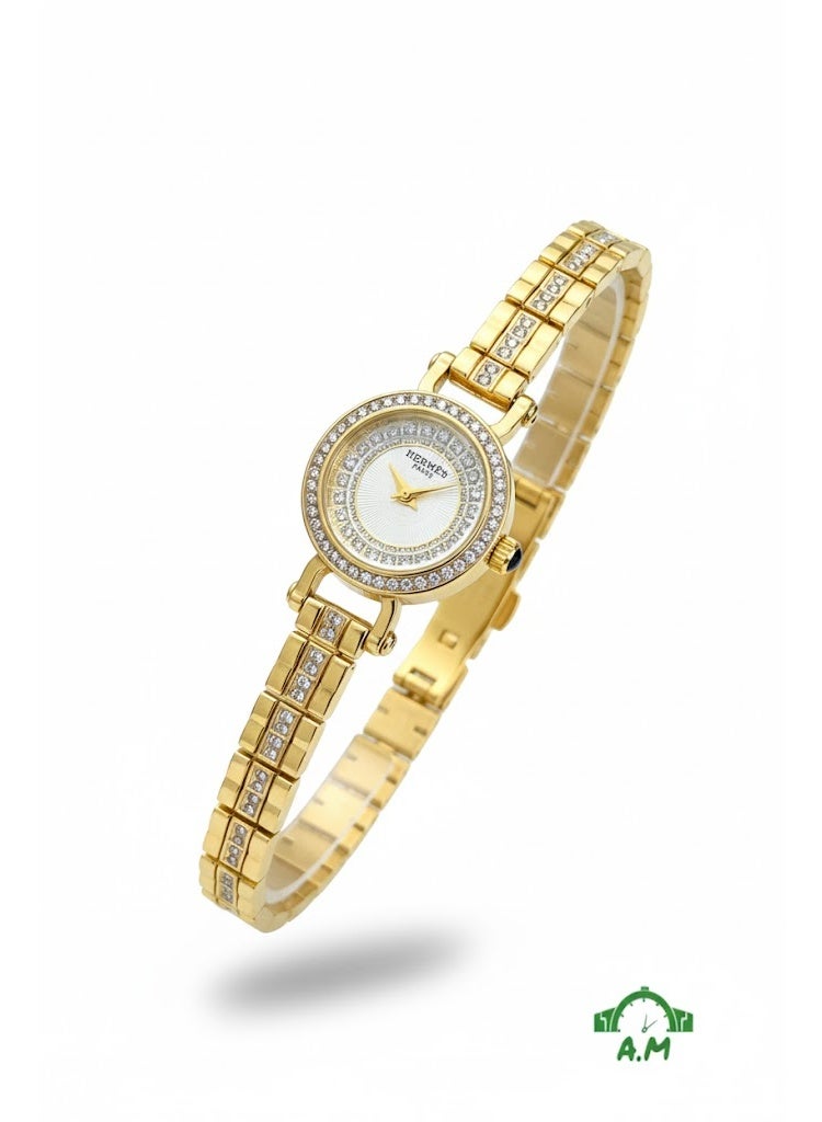 هيرميس ساعة هيرميس باريس النسائية بسوار من الفولاذ المقاوم للصدأ الذهبي وإطار مرصع بالكريستال