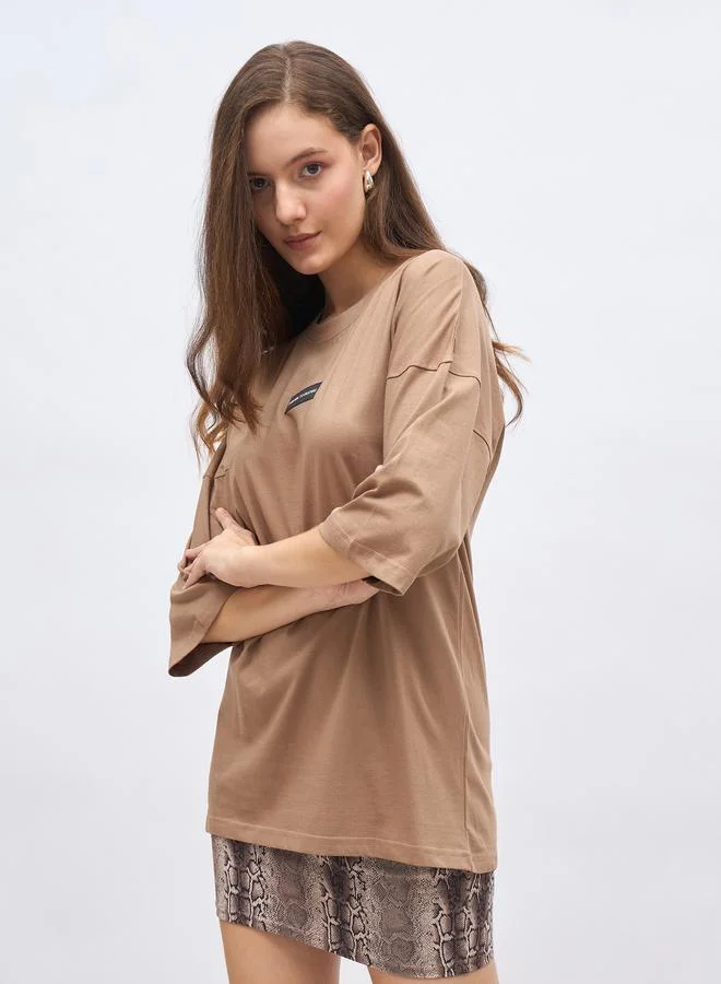 Styli Styli Women Brown Badge Detail Dropped Shoulder Oversized T-Shirt