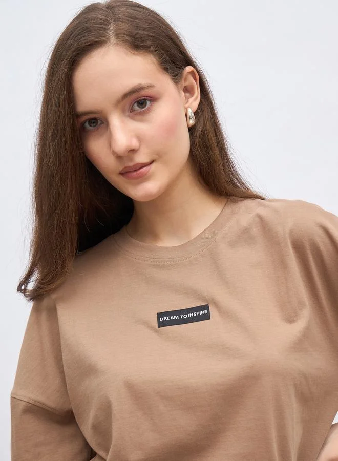 Styli Styli Women Brown Badge Detail Dropped Shoulder Oversized T-Shirt