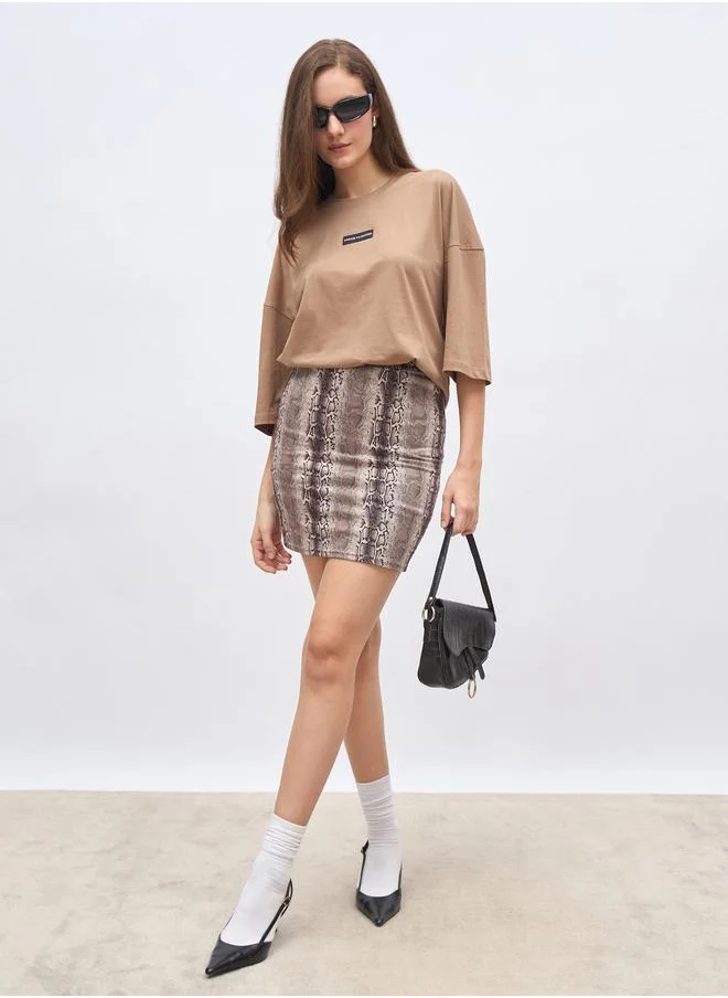 ستايلي Styli Women Brown Badge Detail Dropped Shoulder Oversized T-Shirt