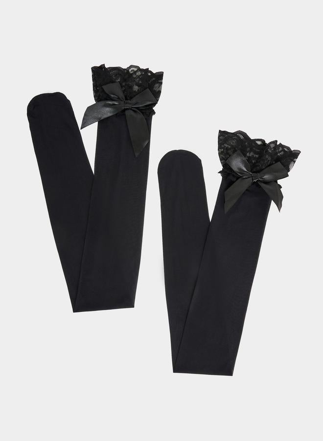 Styli Knee High Solid Mesh Stockings with Lace Edge and Big Satin Bow  - Image 2
