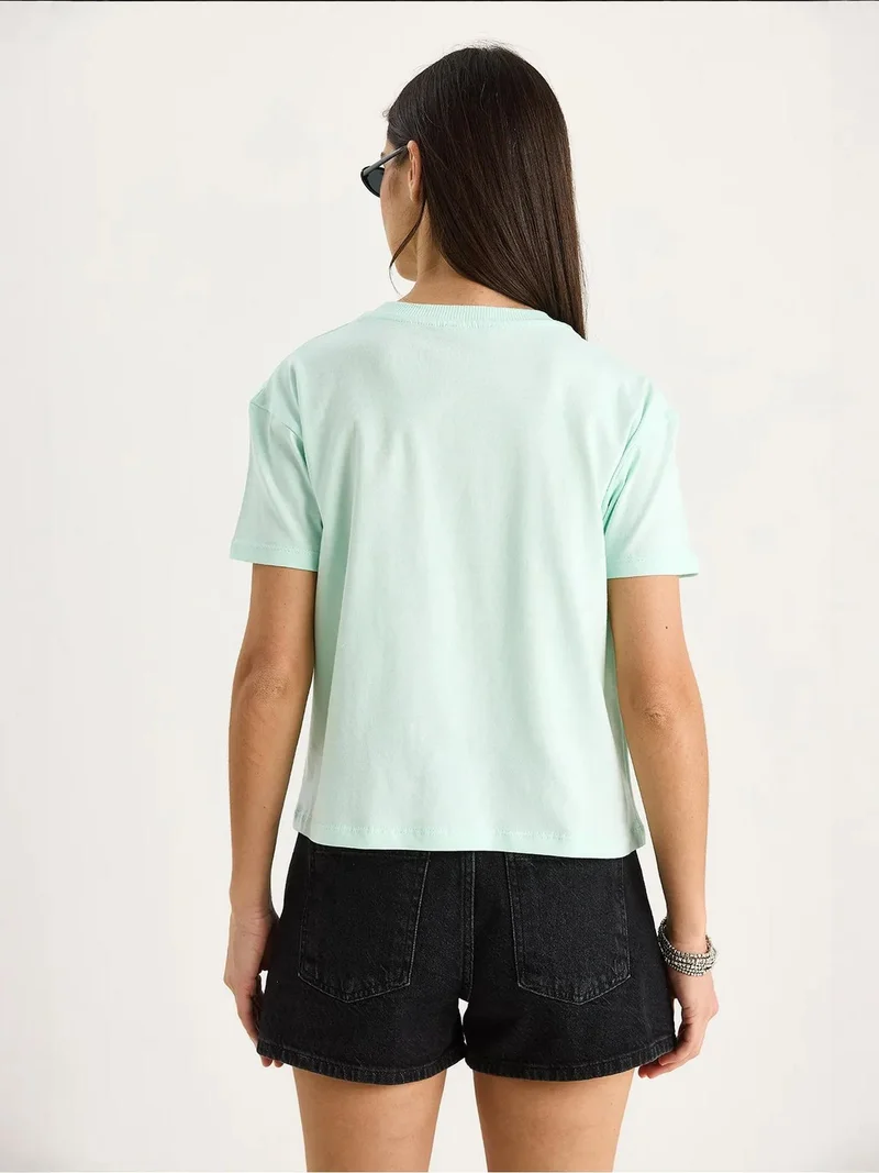 Bianco Lucci Mint Green LUCCI Patterned Crop T-Shirt with Accessory Detail for Women | Best Price UAE