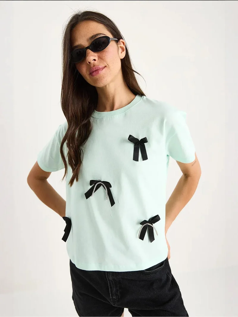 Bianco Lucci Mint Green LUCCI Patterned Crop T-Shirt with Accessory Detail for Women | Best Price UAE
