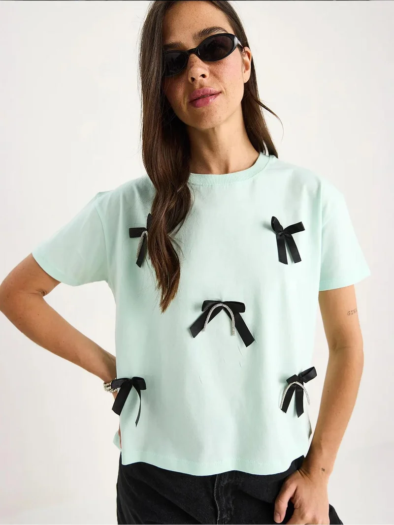 Bianco Lucci Mint Green LUCCI Patterned Crop T-Shirt with Accessory Detail for Women | Best Price UAE