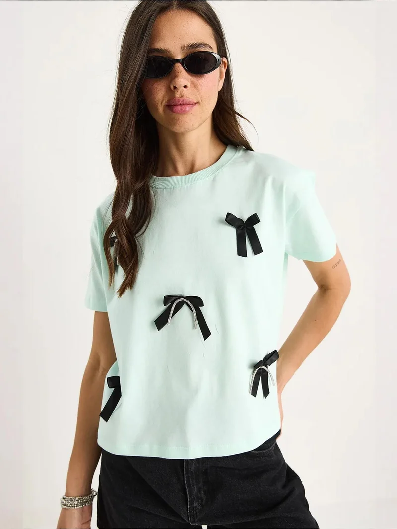 Bianco Lucci Mint Green LUCCI Patterned Crop T-Shirt with Accessory Detail for Women | Best Price UAE