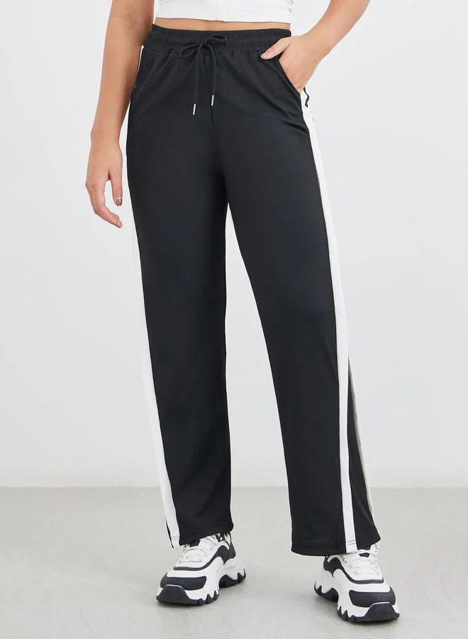 Styli Styli Side Stripe Detail Flared Leggings