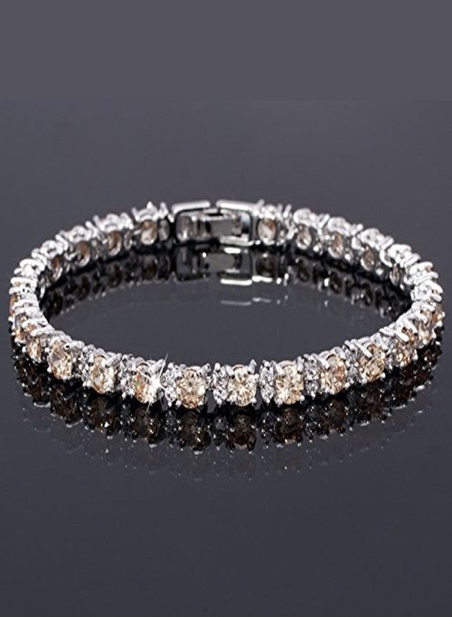 RIZILIA Round Multi-Color CZ Birthstone White Gold Plated Tennis Bracelet, 7", 7 inches, simulated-champagne-diamond - Image 2