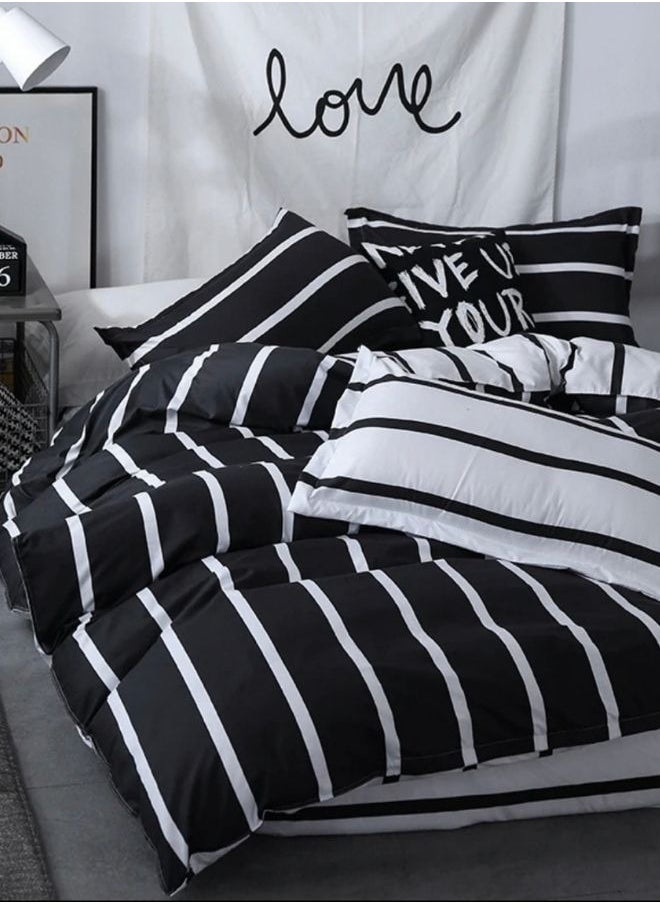 LUNA Home - 4 Piece Striped Single Size Duvet Cover Set. Black and White Reversible Bedding Set. - Image 1