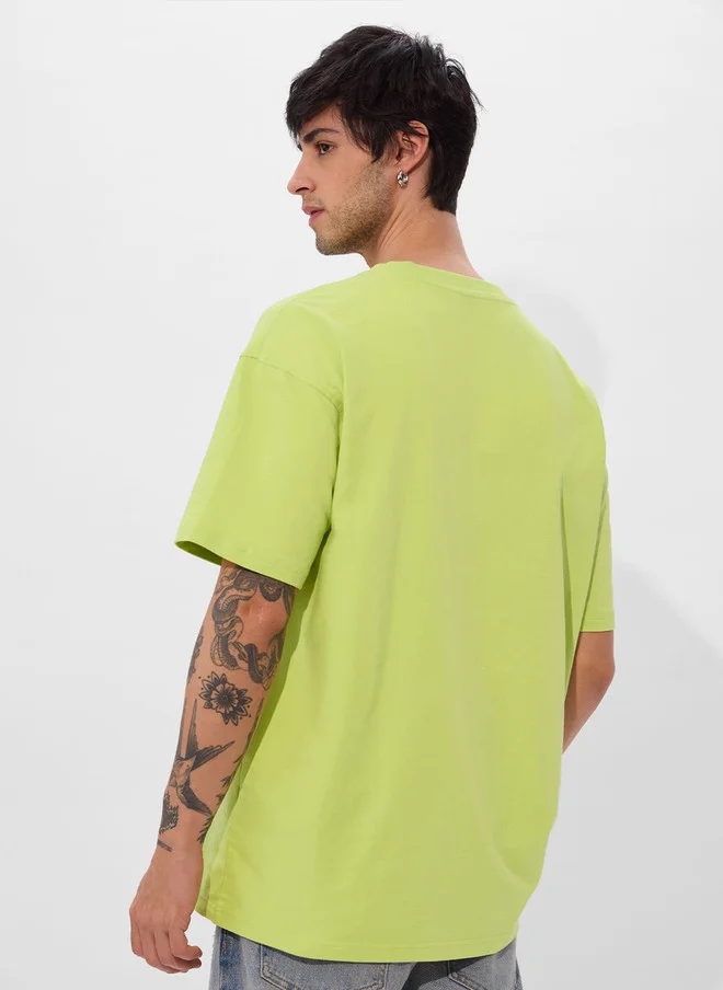 The Souled Store  The Souled Store Men Printed Lime Green Cotton Oversized T-Shirt  | Best Price UAE