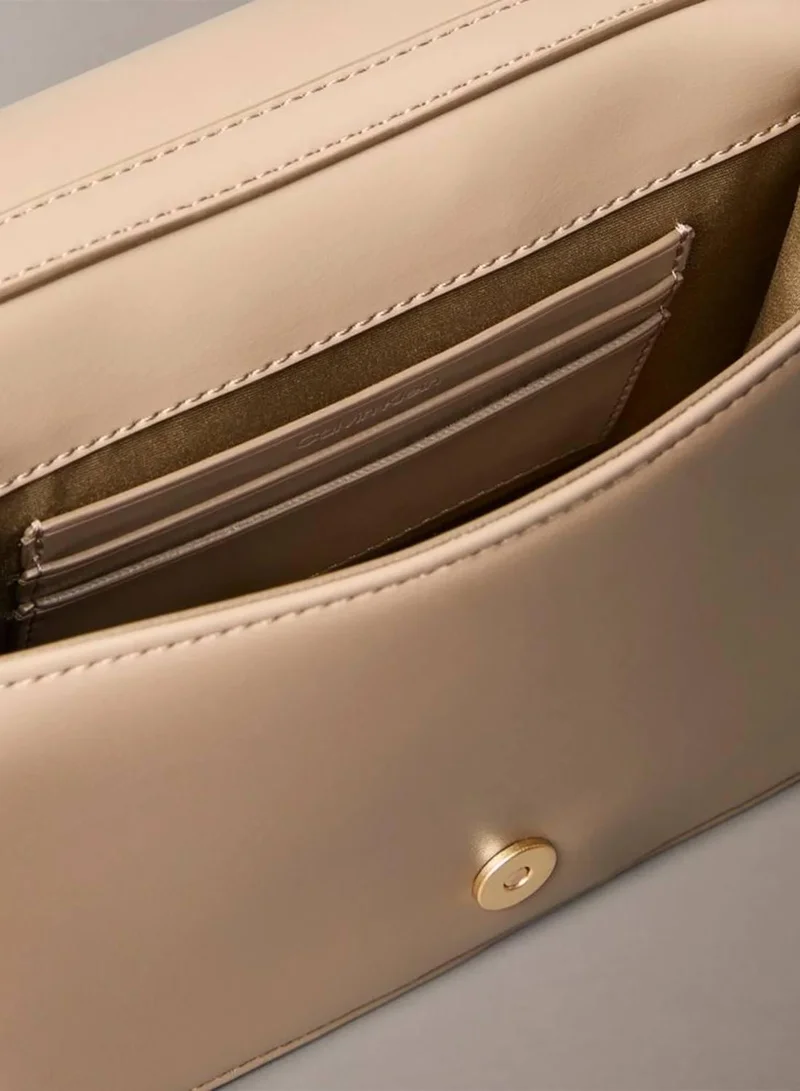 Calvin Klein Desert Taupe Quilted Emblem Logo Mini Bag for Women | Best Price UAE