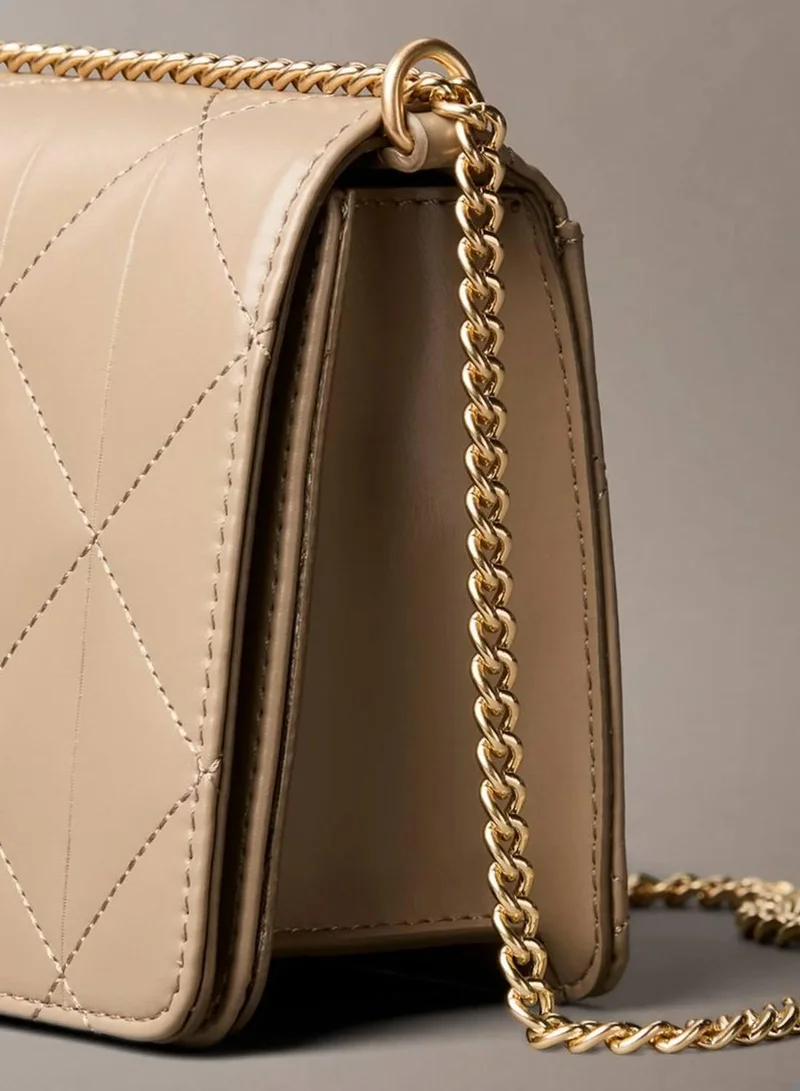 Calvin Klein Desert Taupe Quilted Emblem Logo Mini Bag for Women | Best Price UAE