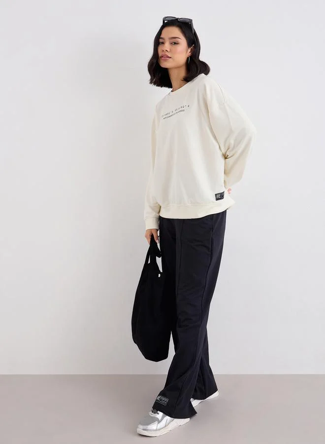 Styli Styli Women Printed Sweatshirt and Wide Joggers Co-Ords