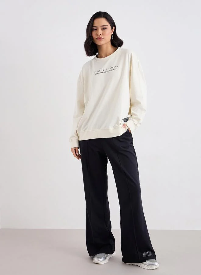 Styli Styli Women Printed Sweatshirt and Wide Joggers Co-Ords