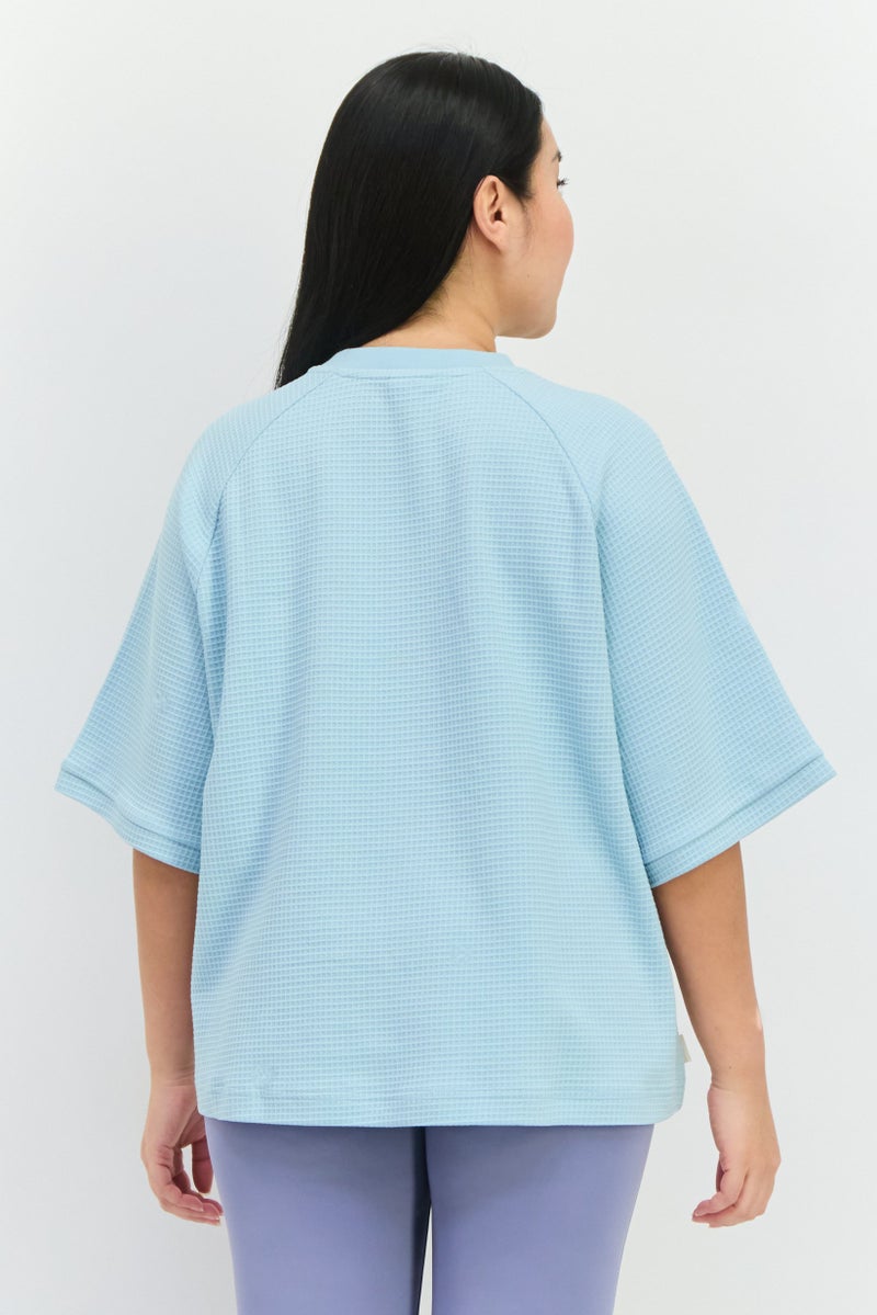 PUMA بلوزة نسائية بأكمام قصيرة مريحة، لون أزرق باهت - Image 4