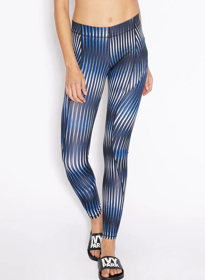 Ivy Park Kaleidostripe Print Mid Rise Ankle Legging