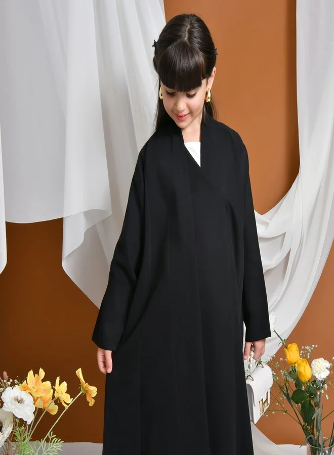 HAWRAA ABAYA Elsa Abaya | Formal design with a side piece that closes with a snap