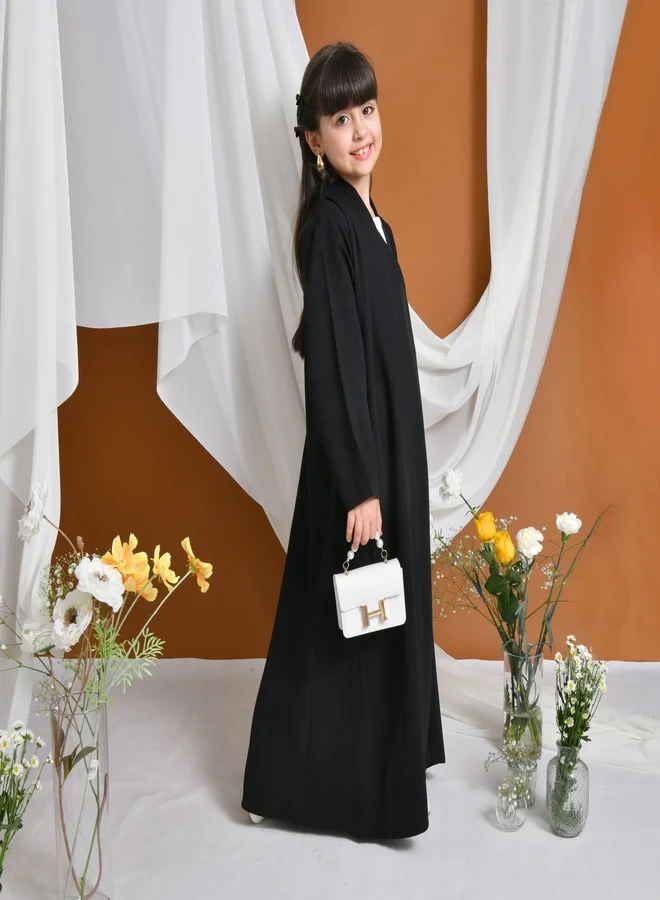 HAWRAA ABAYA Elsa Abaya | Formal design with a side piece that closes with a snap