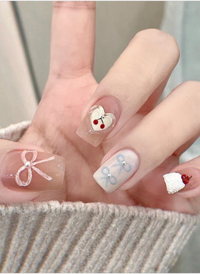 NIBEMINENT 24Pcs Fake Nails, Press Nails In Box,Short-length Flat head shaped Solid Skin White Color Shiny Nail Art,Bow knot,Cake,Love Heart,Zircon,Pearl,Cherry,Fake Nail Patch  - Image 1