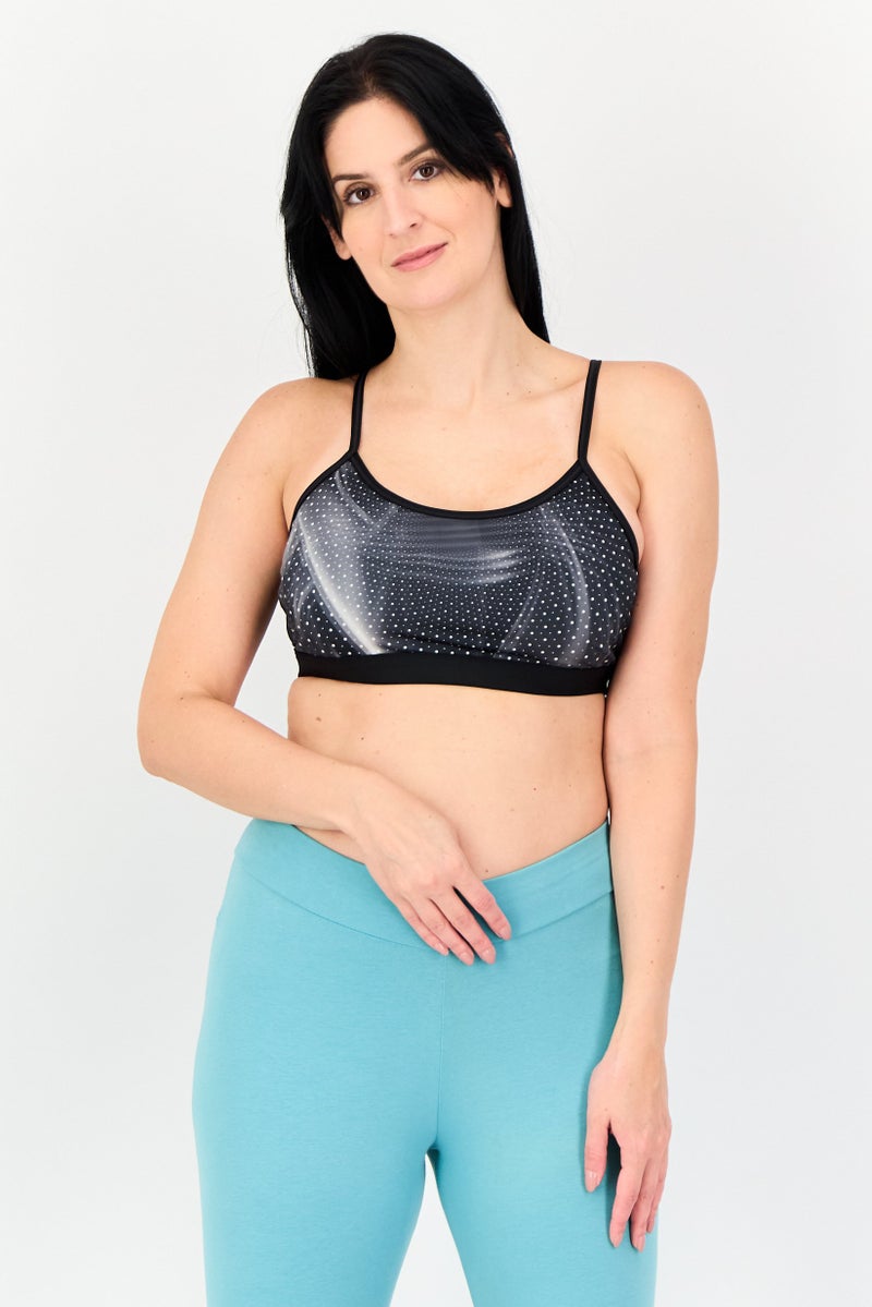 Reebok سوتيان رياضي غير مبطن بطبعة شاملة للنساء، متعدد الألوان - Image 1